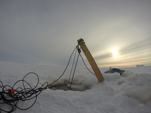 Reusing a fishing hole in the ice, on the east side of the big iceberg. This was the winner spot. Photo: L. Agusti
